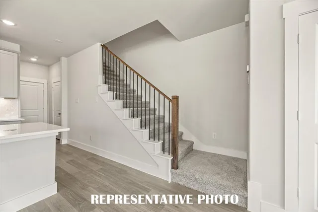 a bathroom with a sink double vanity and a mirror
