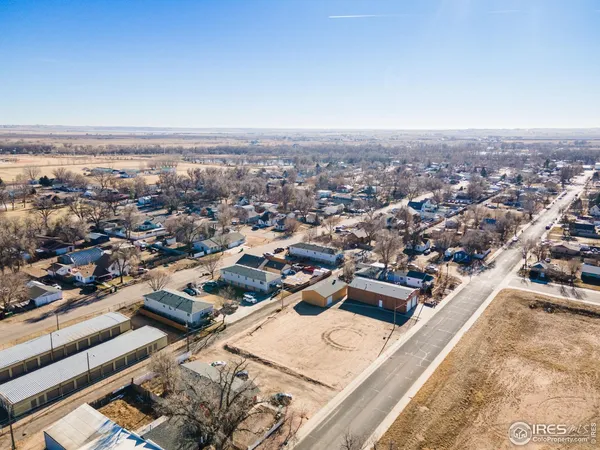 an aerial view of residential house with parking space
