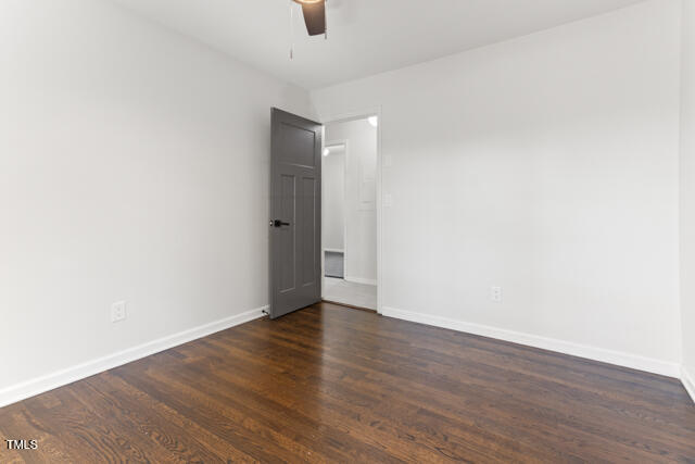 1512 Broken Road Bailey, NC 27807 - Photo 24 of 26 a view of an empty room with wooden floor