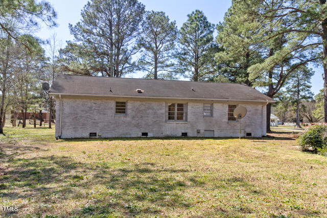1512 Broken Road Bailey, NC 27807 - Photo 7 of 26 a view of a house with a yard