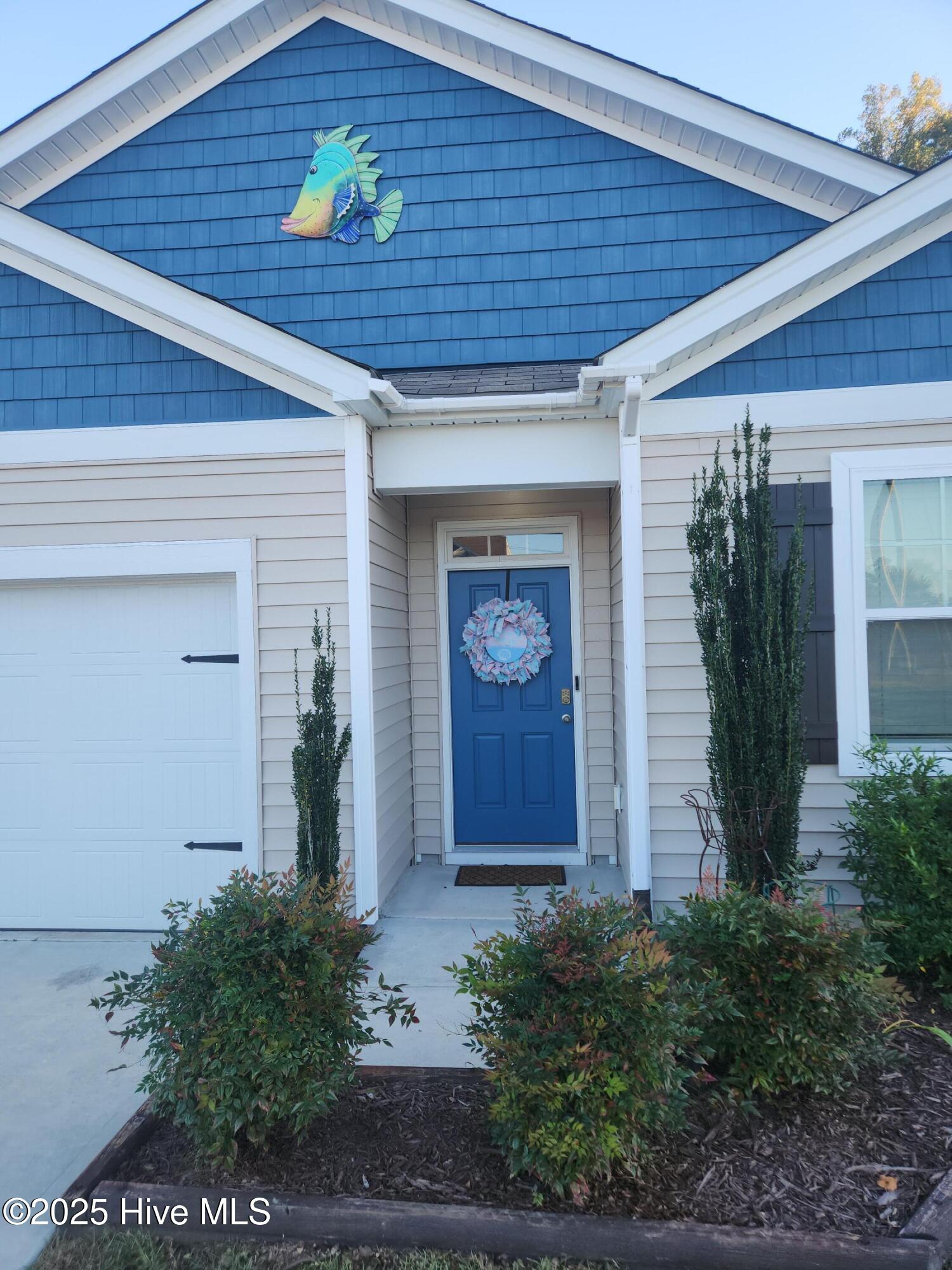 704 Lenox Drive Holly Ridge, NC 28445 - Photo 3 of 45 20251023_174708