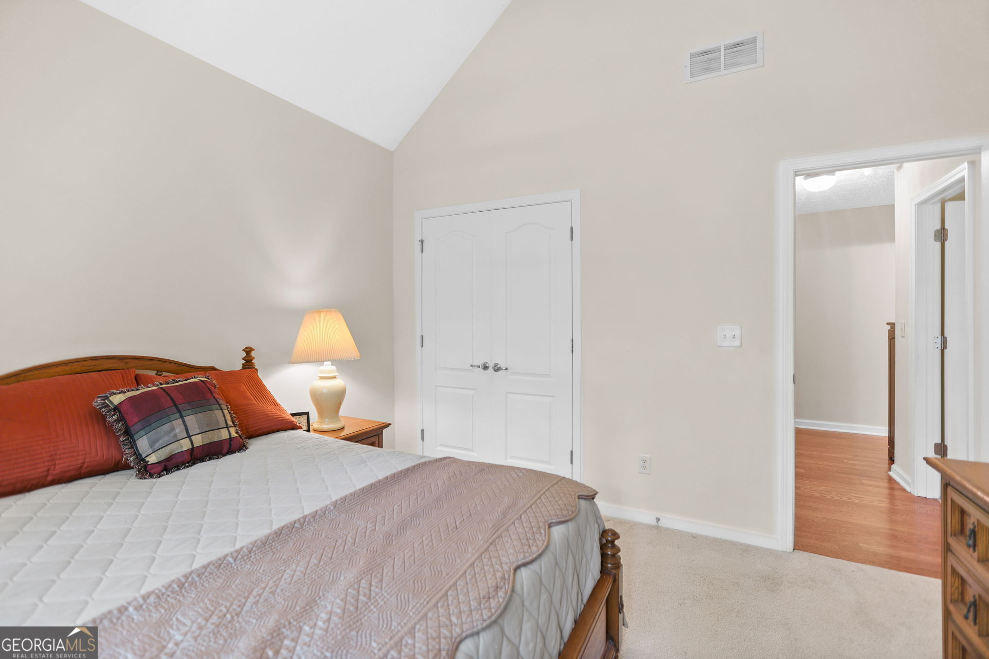 892 Brooks Woolsey Road Brooks, GA 30205 - Photo 25 of 45 a bedroom with a bed and a table