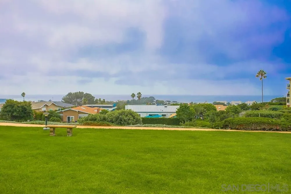 640 East Solana Circle Solana Beach, CA 92075 - Photo 13 of 15 a view of building with garden and houses in the background