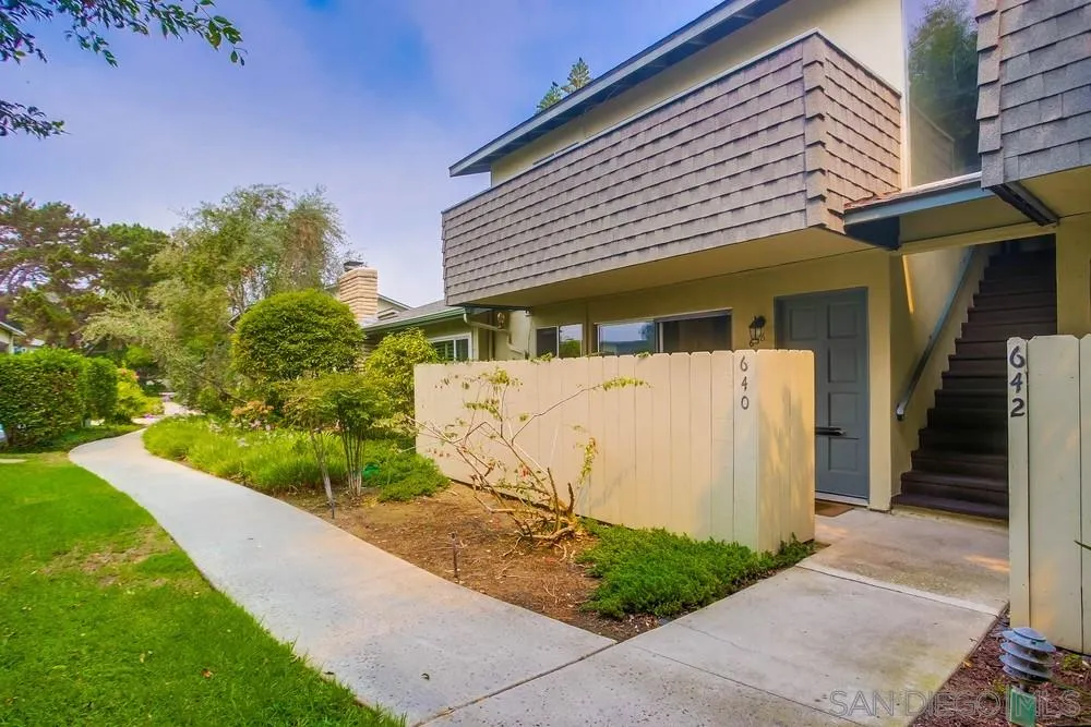 640 East Solana Circle Solana Beach, CA 92075 - Photo 9 of 15 a view of a house with a small yard and a garage