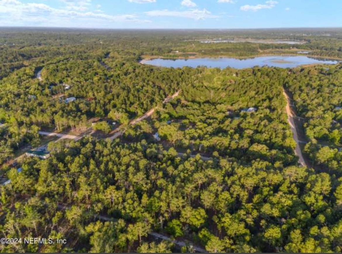 7395 Hoosier Avenue Keystone Heights, FL 32656 - Photo 2 of 5 a view of a city with an ocean