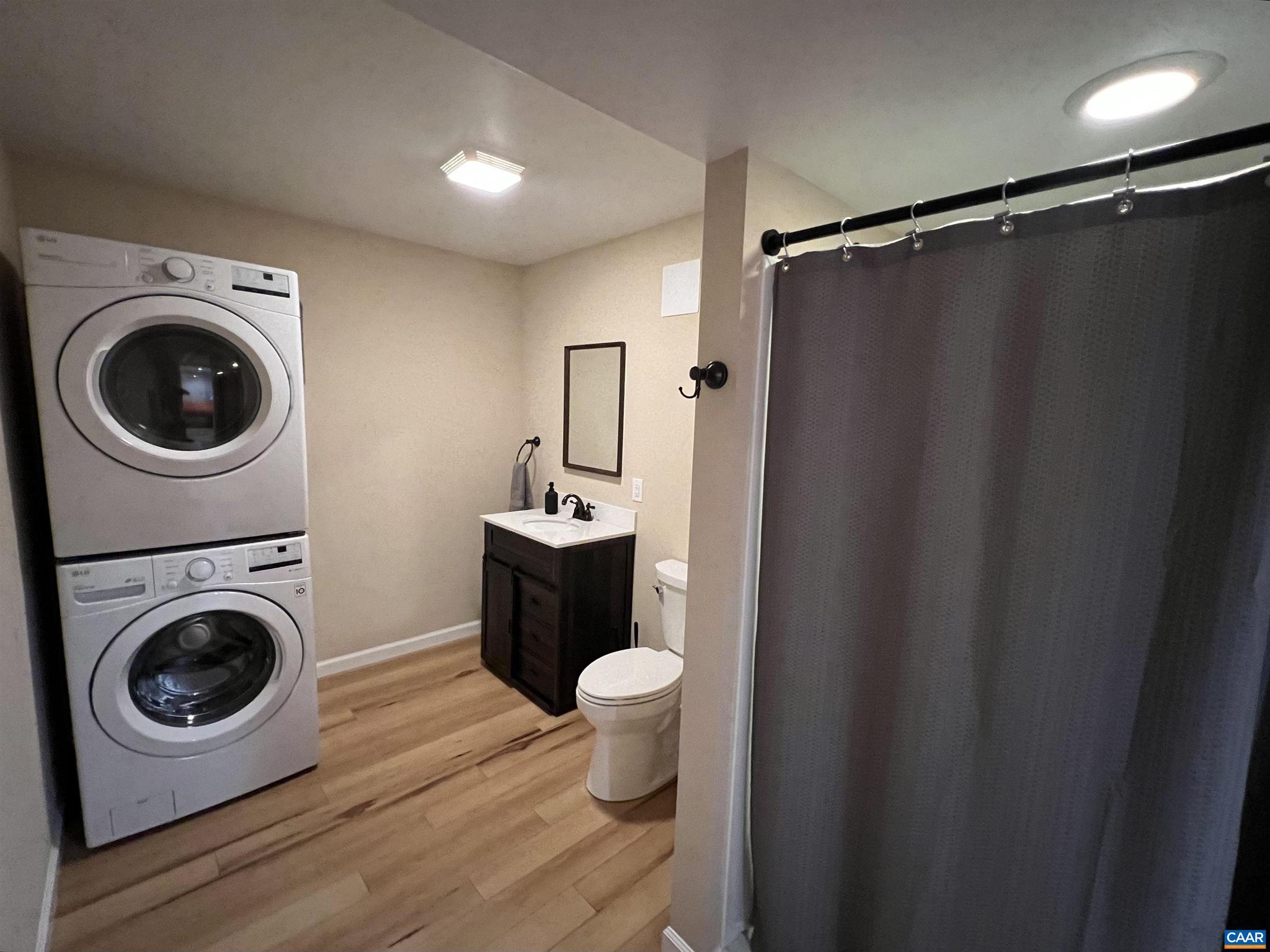 248 Raven Way Free Union, VA 22940 - Photo 32 of 47 a bathroom with a sink a toilet and a shower