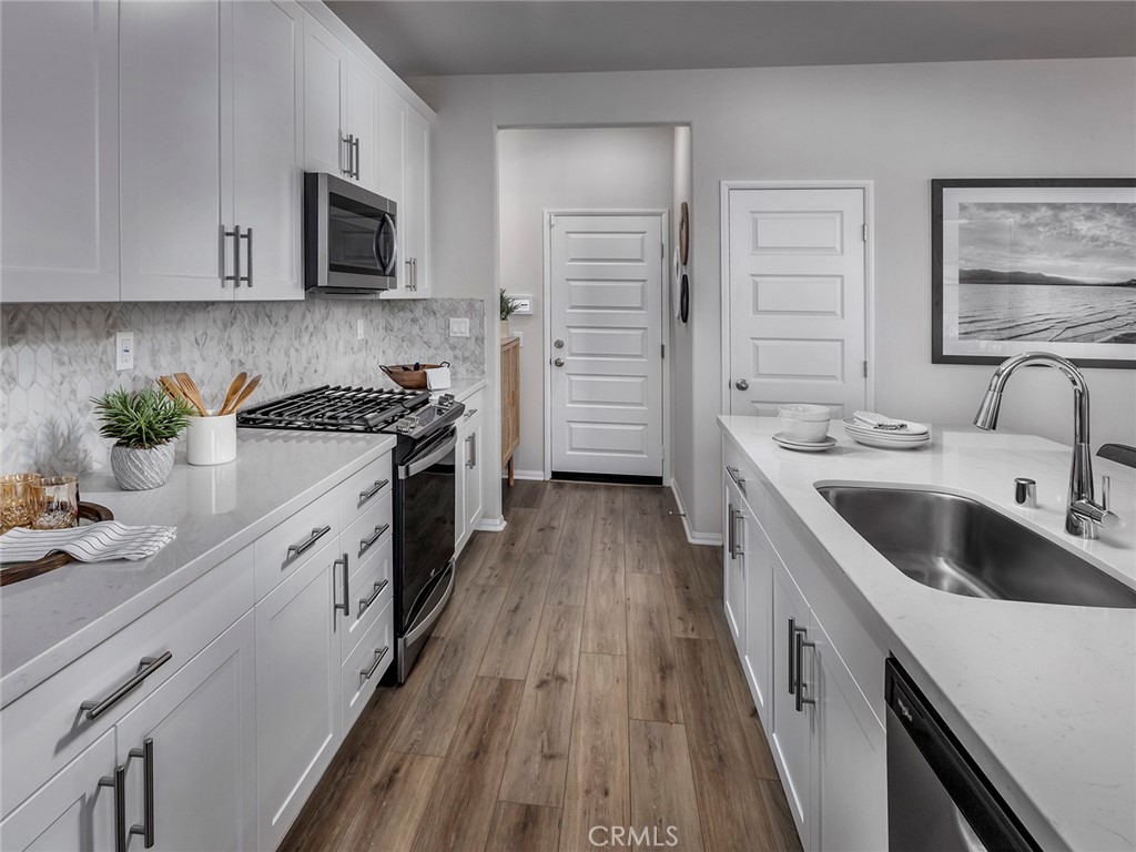 2043 Grapefruit Street Redlands, CA 92374 - Photo 4 of 11 Photo is not of the actual home, but is an inspirational photo of builder’s model home and may depict options, furnishings, and/or decorator features that are not included