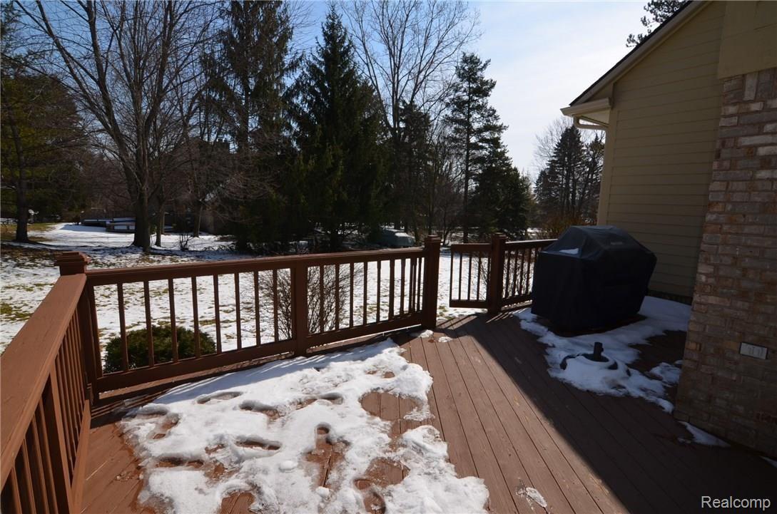 6389 Cherry Tree Court Rochester, MI 48306 - Photo 7 of 30 SUNNY DECK OVER LOOKING PARK-LIKE YARD