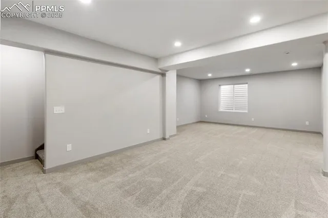 a view of a backyard with sitting area