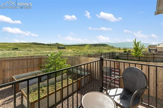 a view of a balcony with an ocean view