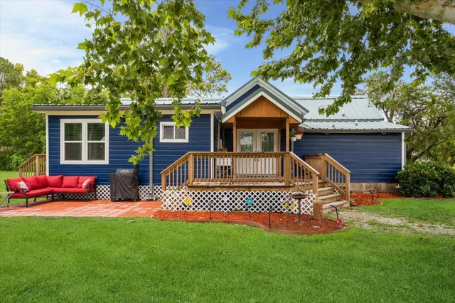 front view of a house with a yard