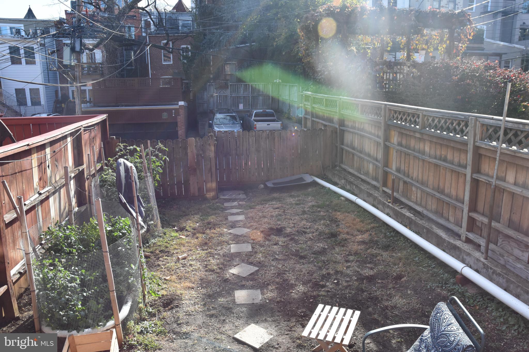 1810 Belmont Road Northwest Washington, DC 20009 - Photo 8 of 10 Deep, fenced Backyard