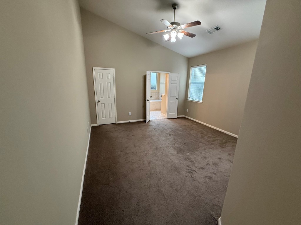 3011 Grovewick Lane Dickinson, TX 77539 - Photo 11 of 28 wooden floor in an empty room with a window