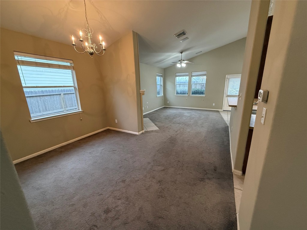 3011 Grovewick Lane Dickinson, TX 77539 - Photo 4 of 28 an empty room with windows and entrance
