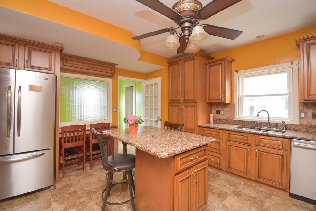 141 Oak Street Springfield, MA 01109 - Photo 10 of 40 a kitchen with a sink appliances and cabinets