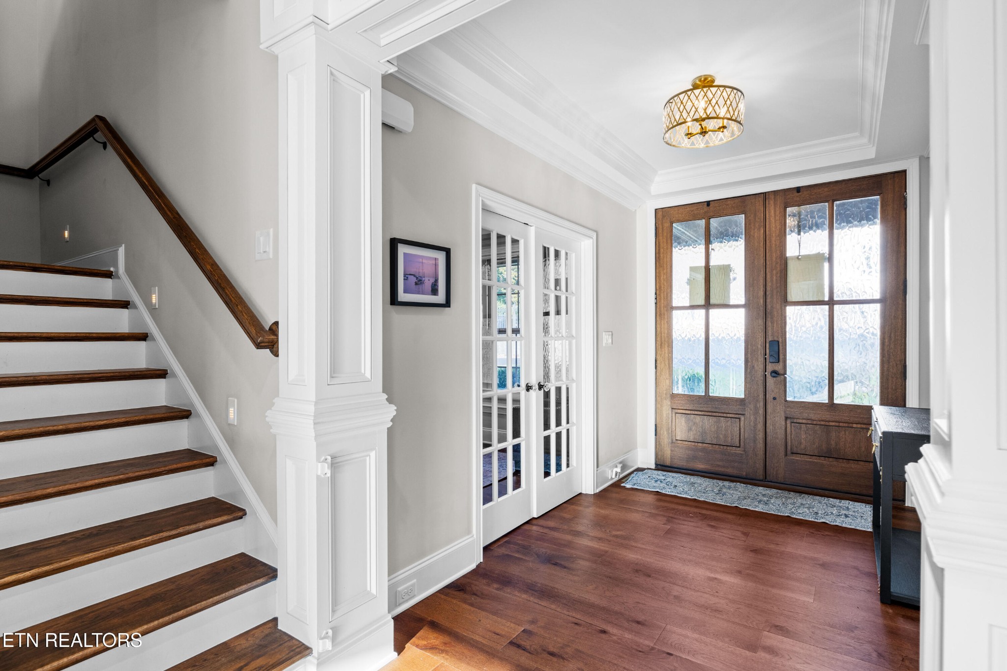 3109 Gazebo Point Way Knoxville, TN 37920 - Photo 13 of 57 a view of entryway with stairs and wooden floor