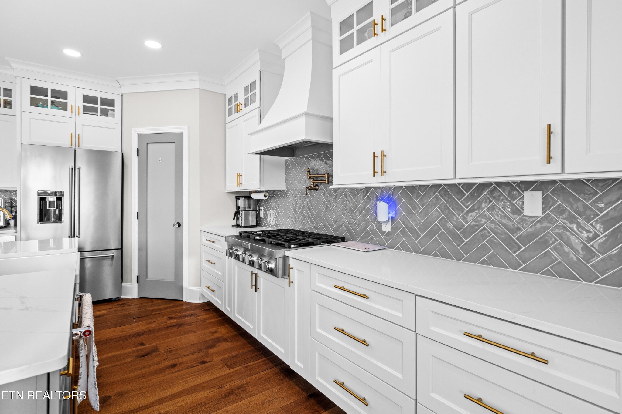 3109 Gazebo Point Way Knoxville, TN 37920 - Photo 20 of 57 a kitchen with stainless steel appliances granite countertop a stove a refrigerator and a white cabinets