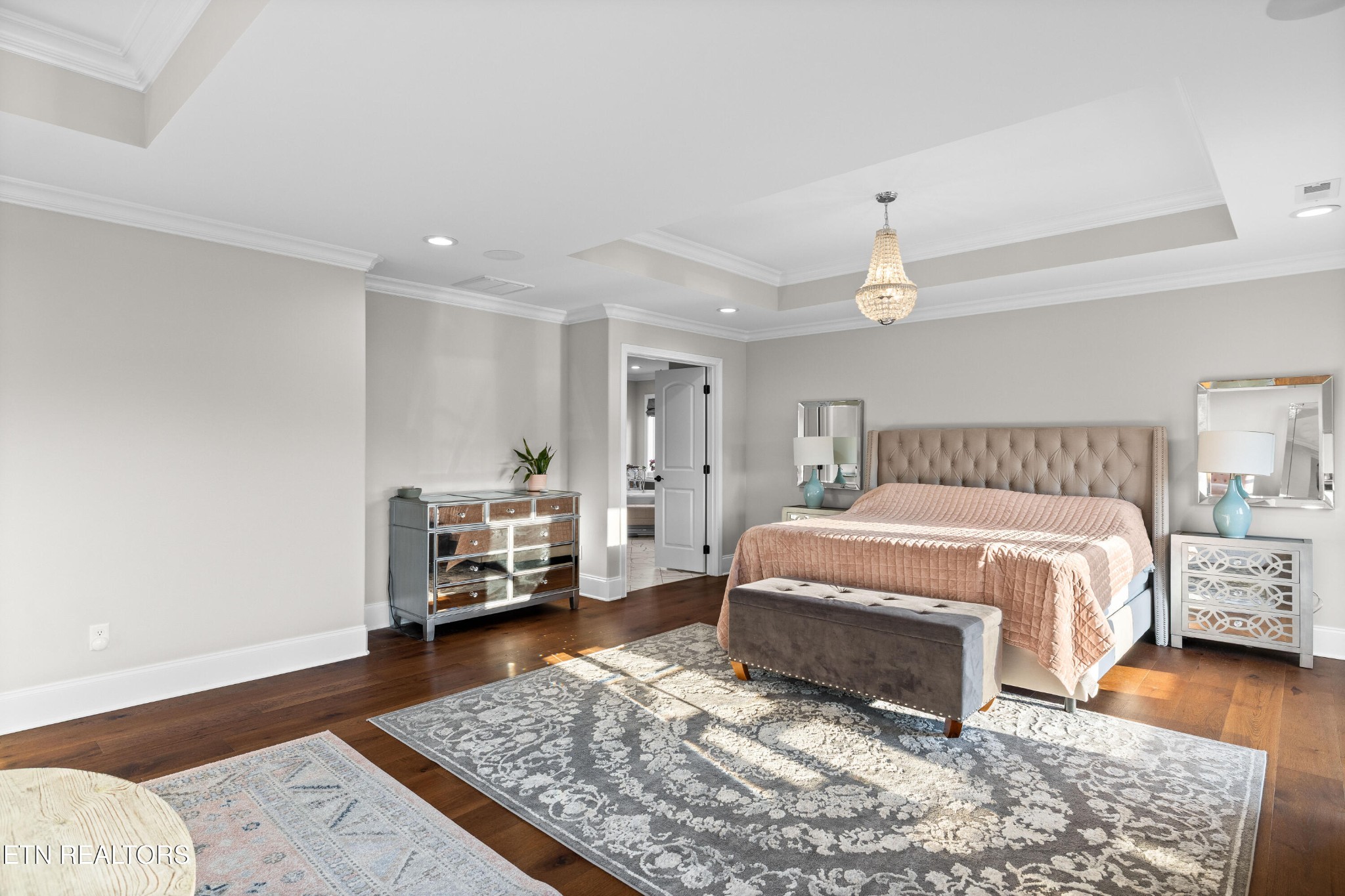 3109 Gazebo Point Way Knoxville, TN 37920 - Photo 24 of 57 a spacious bedroom with a bed and wooden floor