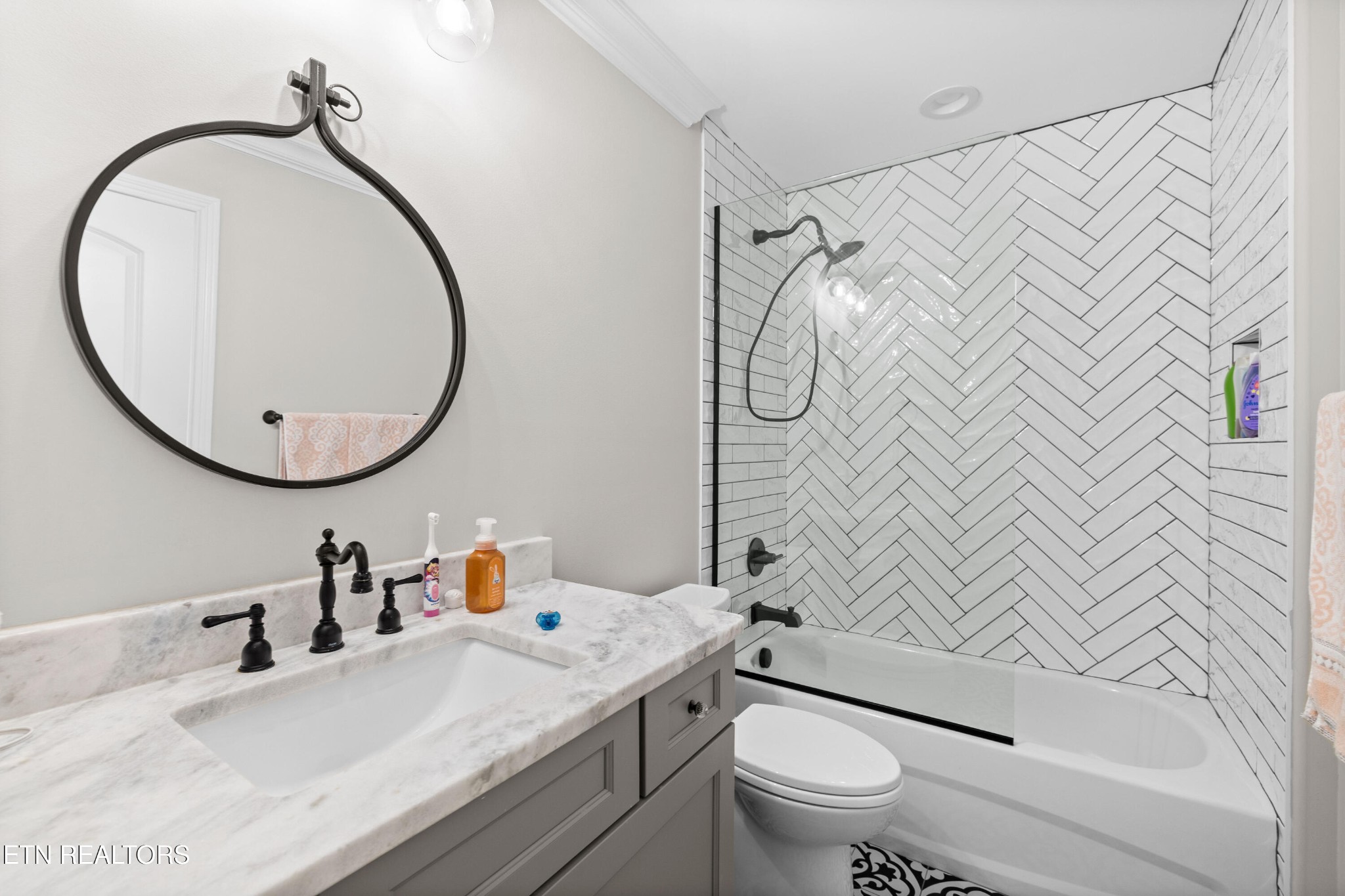 3109 Gazebo Point Way Knoxville, TN 37920 - Photo 30 of 57 a bathroom with a sink vanity mirror and toilet