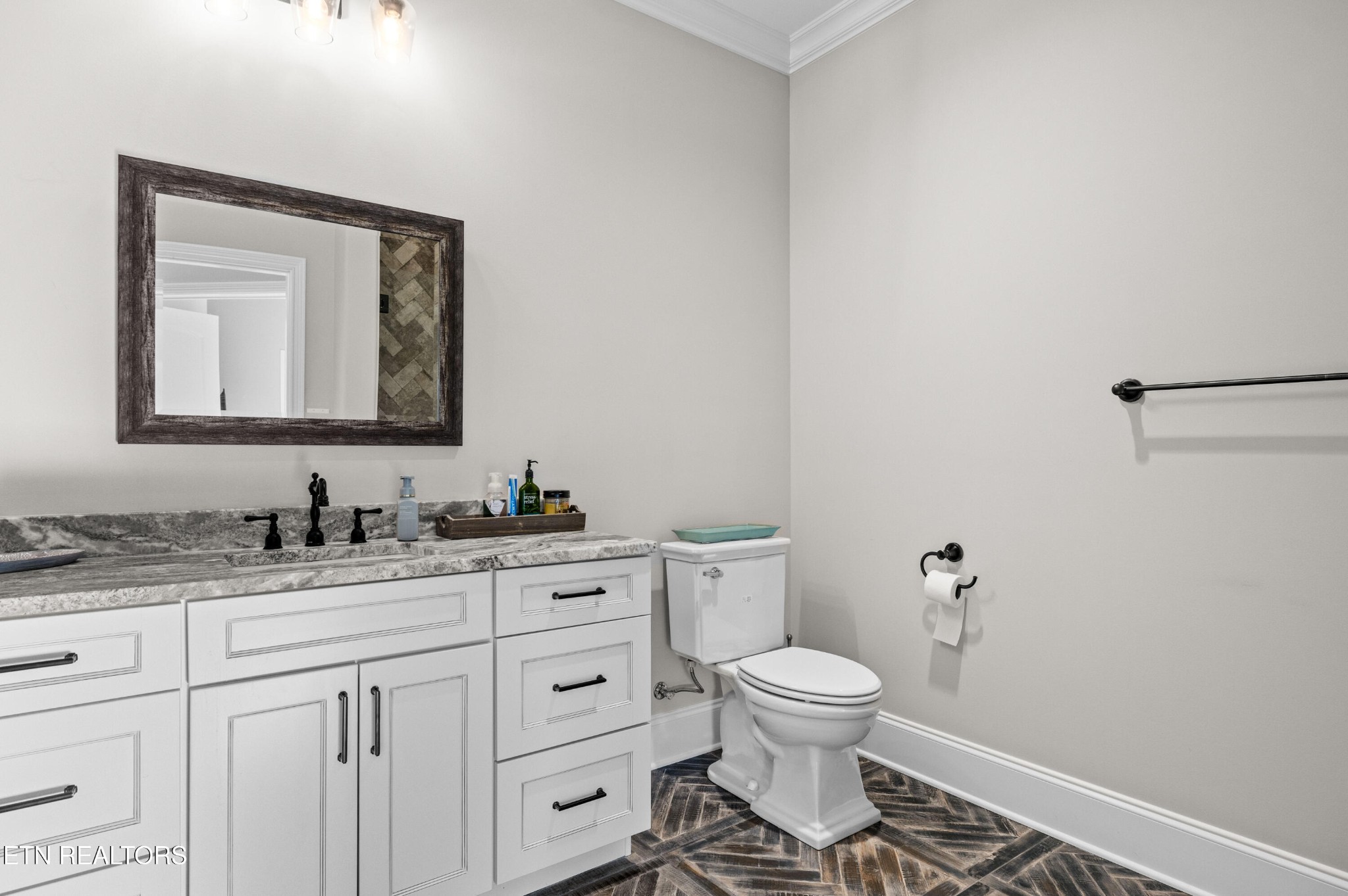 3109 Gazebo Point Way Knoxville, TN 37920 - Photo 42 of 57 a bathroom with a toilet a sink and mirror