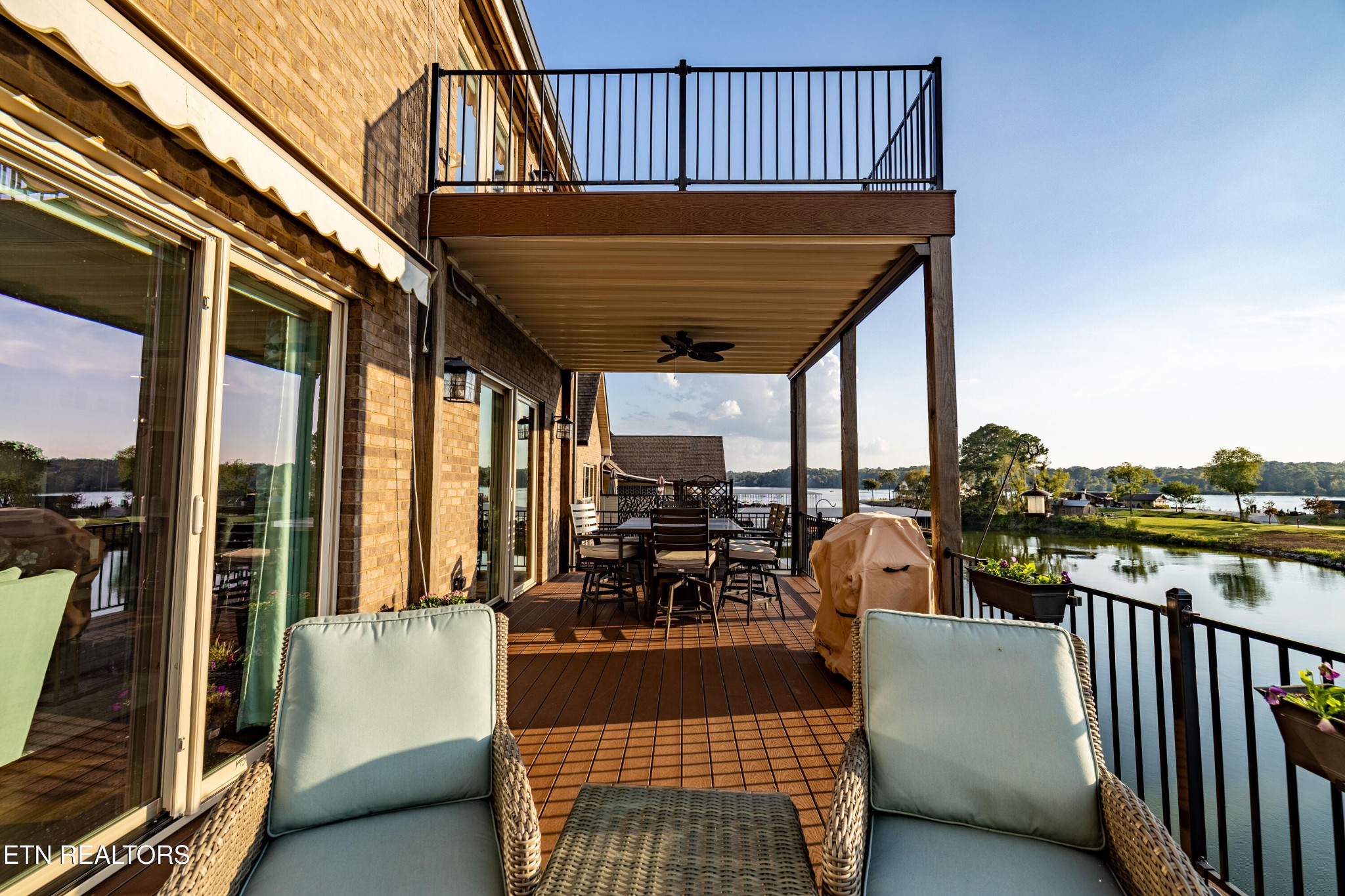 3109 Gazebo Point Way Knoxville, TN 37920 - Photo 43 of 57 a view of balcony with couch and wooden floor