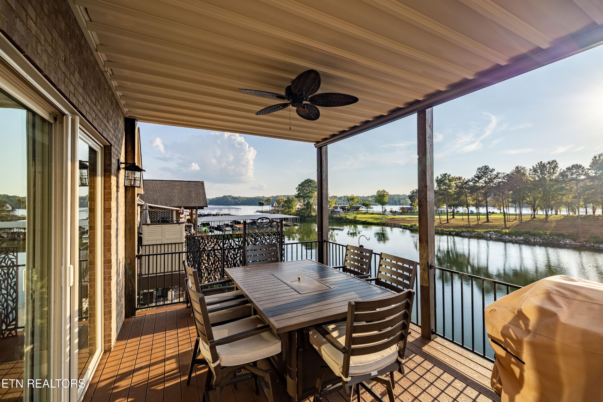 3109 Gazebo Point Way Knoxville, TN 37920 - Photo 7 of 57 a view of a balcony with a table and chairs