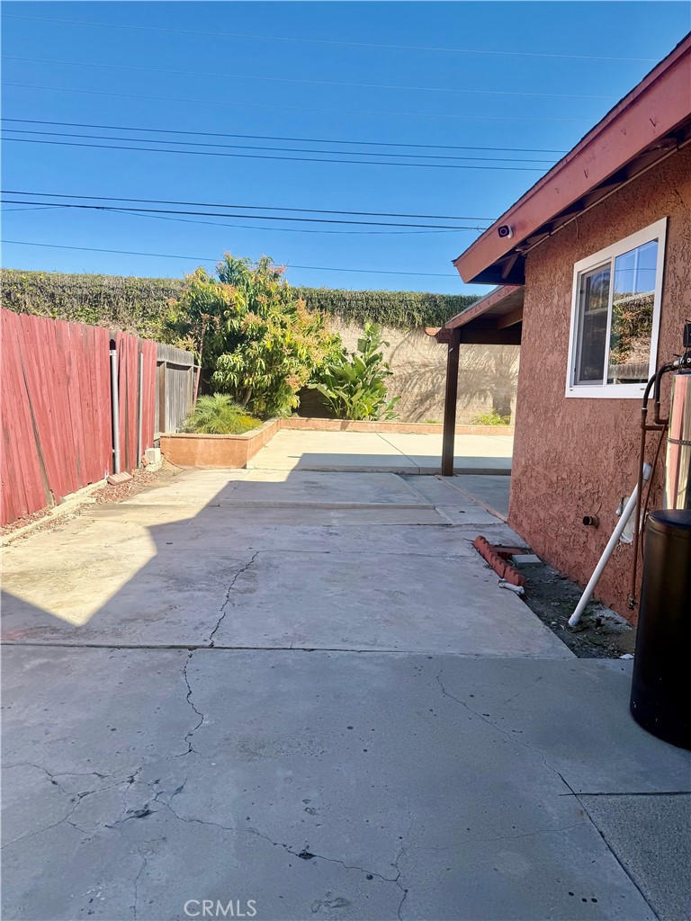 5982 Harrison Street Chino, CA 91710 - Photo 13 of 43 a backyard of a house with a shaded area