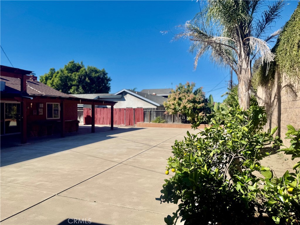 5982 Harrison Street Chino, CA 91710 - Photo 3 of 43 a front view of a house with a yard