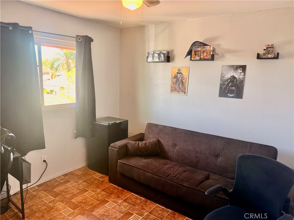 5982 Harrison Street Chino, CA 91710 - Photo 33 of 43 a living room with furniture and a window