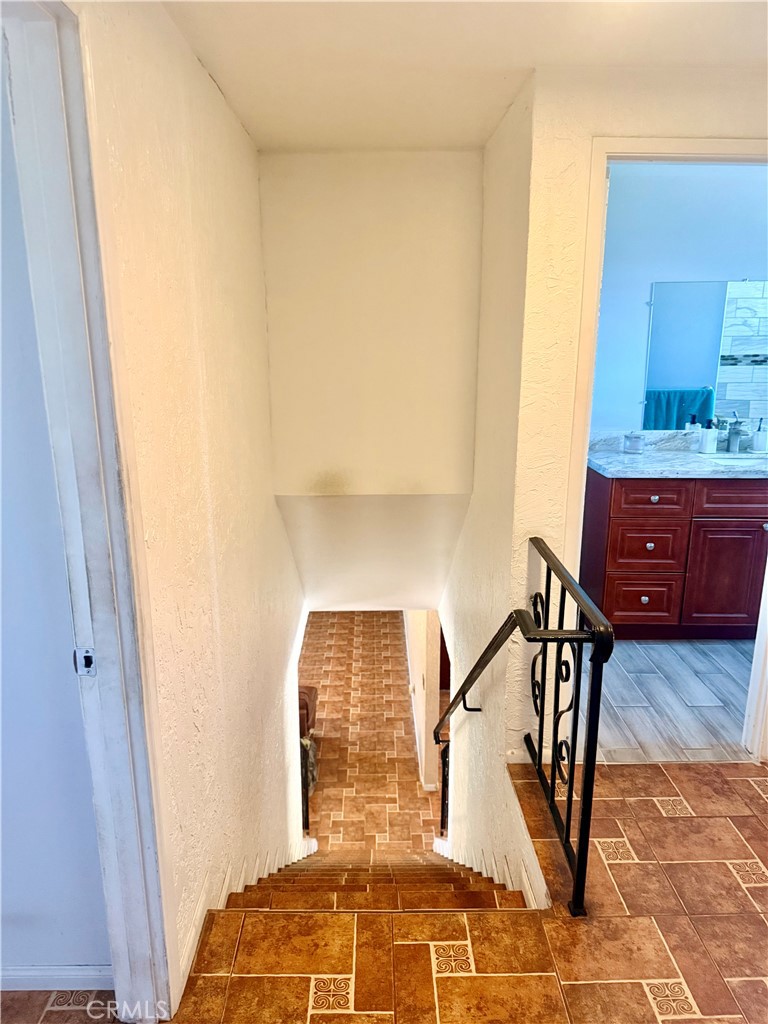 5982 Harrison Street Chino, CA 91710 - Photo 36 of 43 a view of staircase with a rug