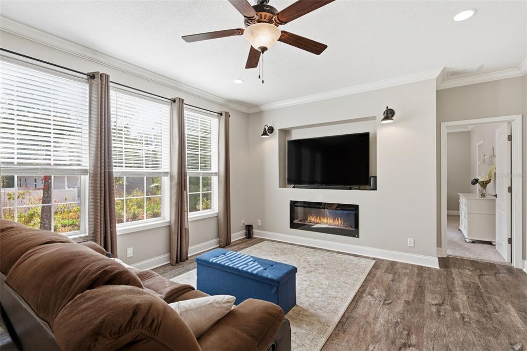 6170 La Pine Road Brooksville, FL 34602 - Photo 20 of 63 a living room with furniture and a flat screen tv