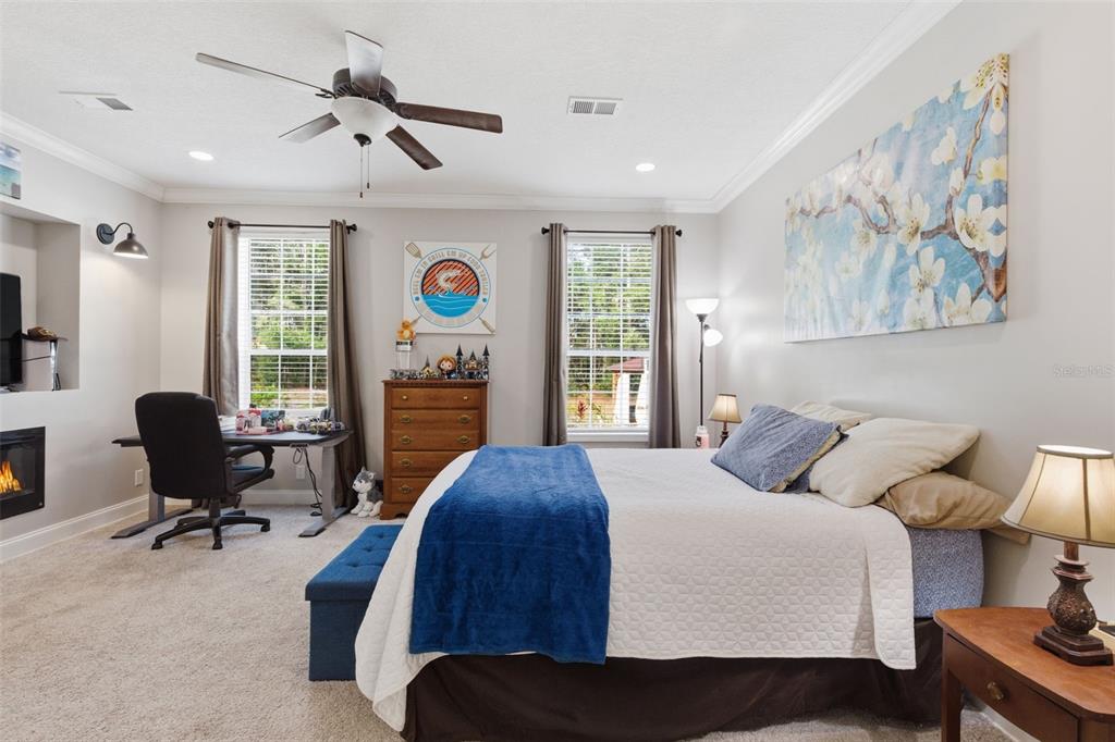 6170 La Pine Road Brooksville, FL 34602 - Photo 31 of 63 a bedroom with a bed gym equipment and a window