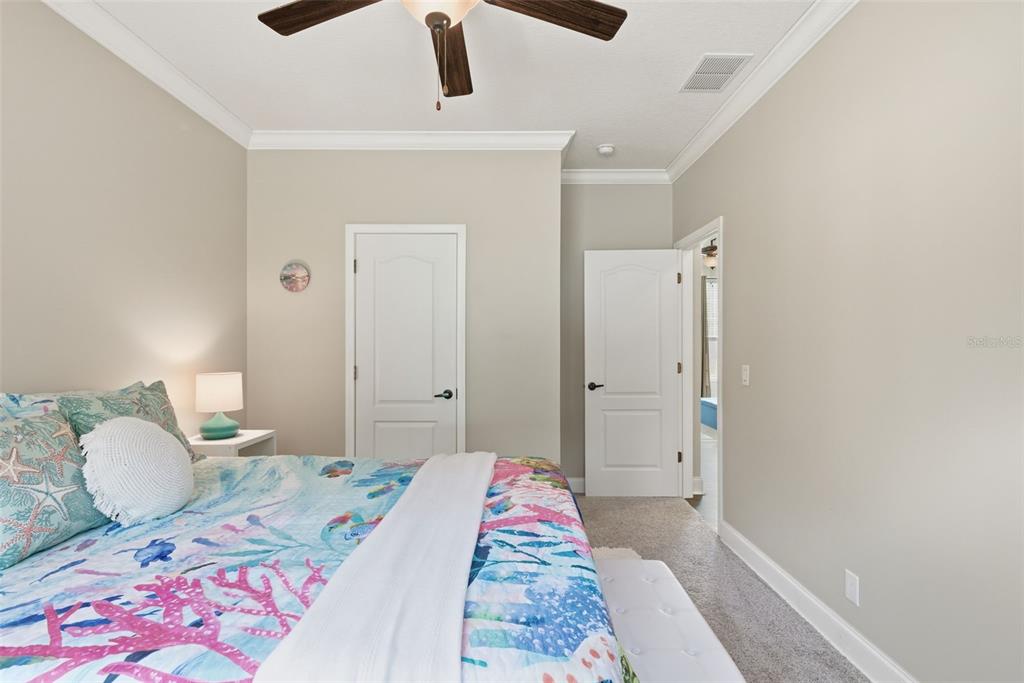 6170 La Pine Road Brooksville, FL 34602 - Photo 36 of 63 a bedroom with a bed and dresser