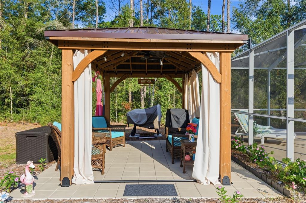 6170 La Pine Road Brooksville, FL 34602 - Photo 46 of 63 a view of porch with chairs and couches