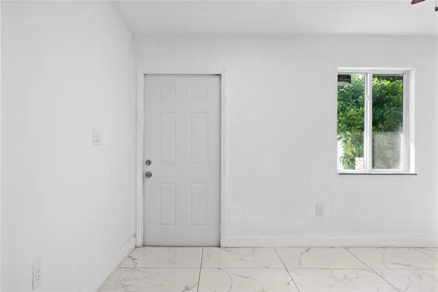 a view of an empty room with window