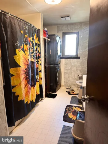 a bedroom with a bed and a closet