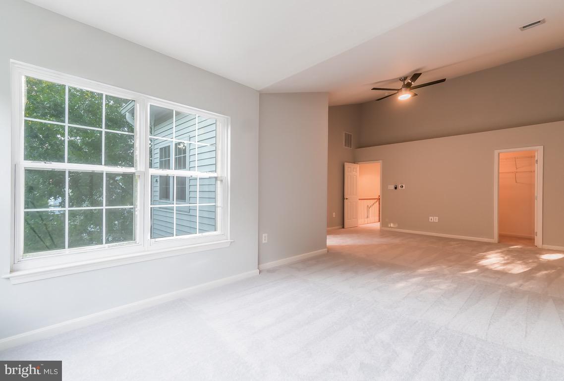 7324 Fountain Spring Court Springfield, VA 22150 - Photo 22 of 35 a view of an empty room with a window