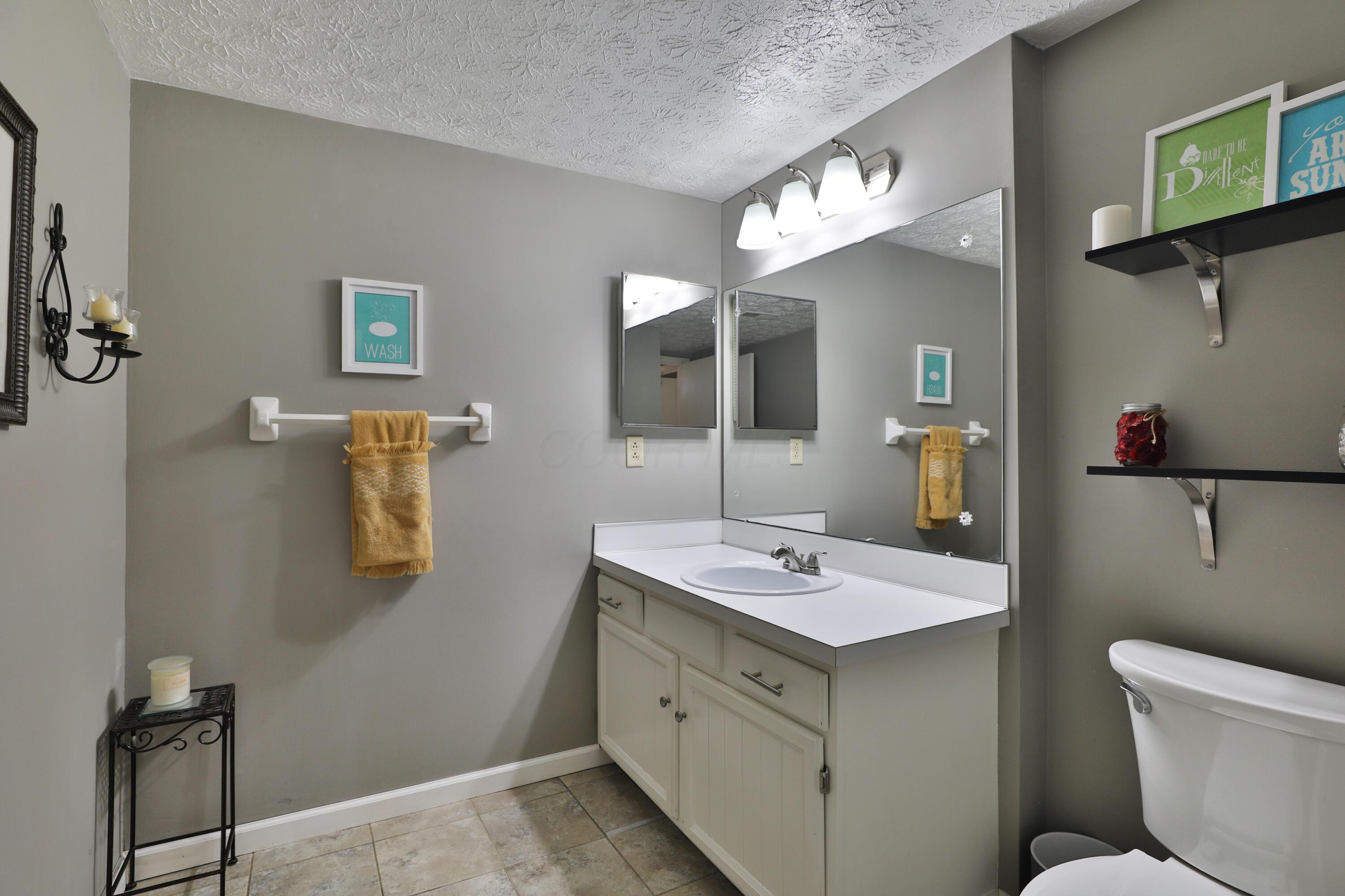 7044 Linworth Road Columbus, OH 43235 - Photo 37 of 48 Full lower level bathroom