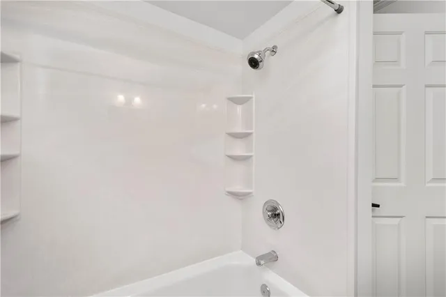 a bathroom with a bathtub