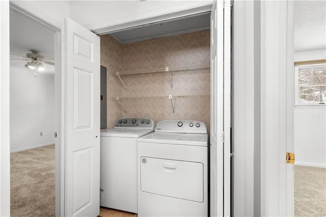 a utility room with dryer and washer