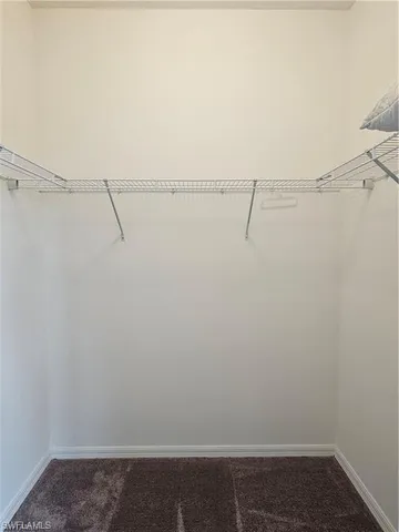 a view of small space with racks on the wall