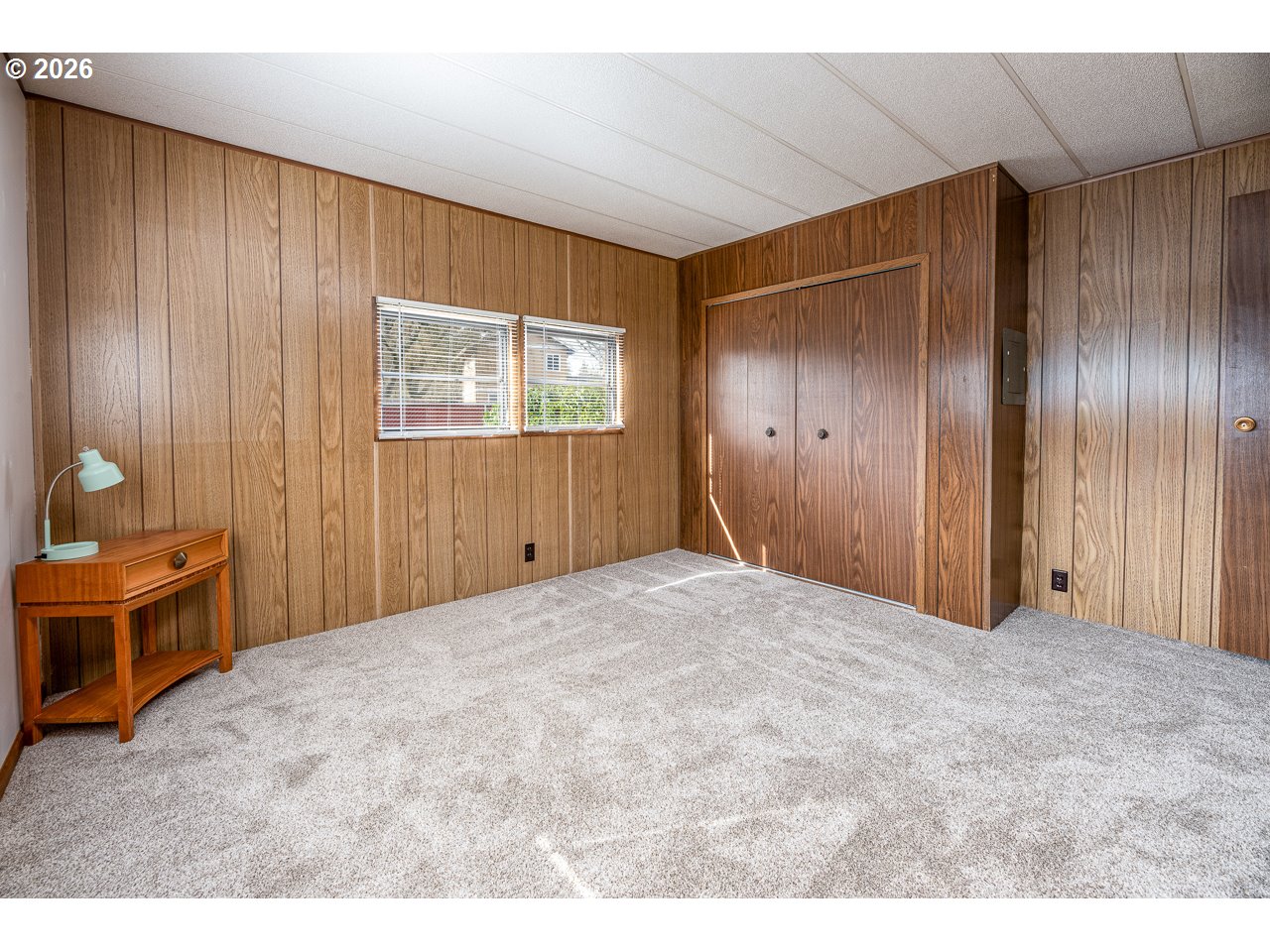 1475 Green Acres Road, Unit 172 Eugene, OR 97408 - Photo 16 of 20 a view of an empty room with wooden floor