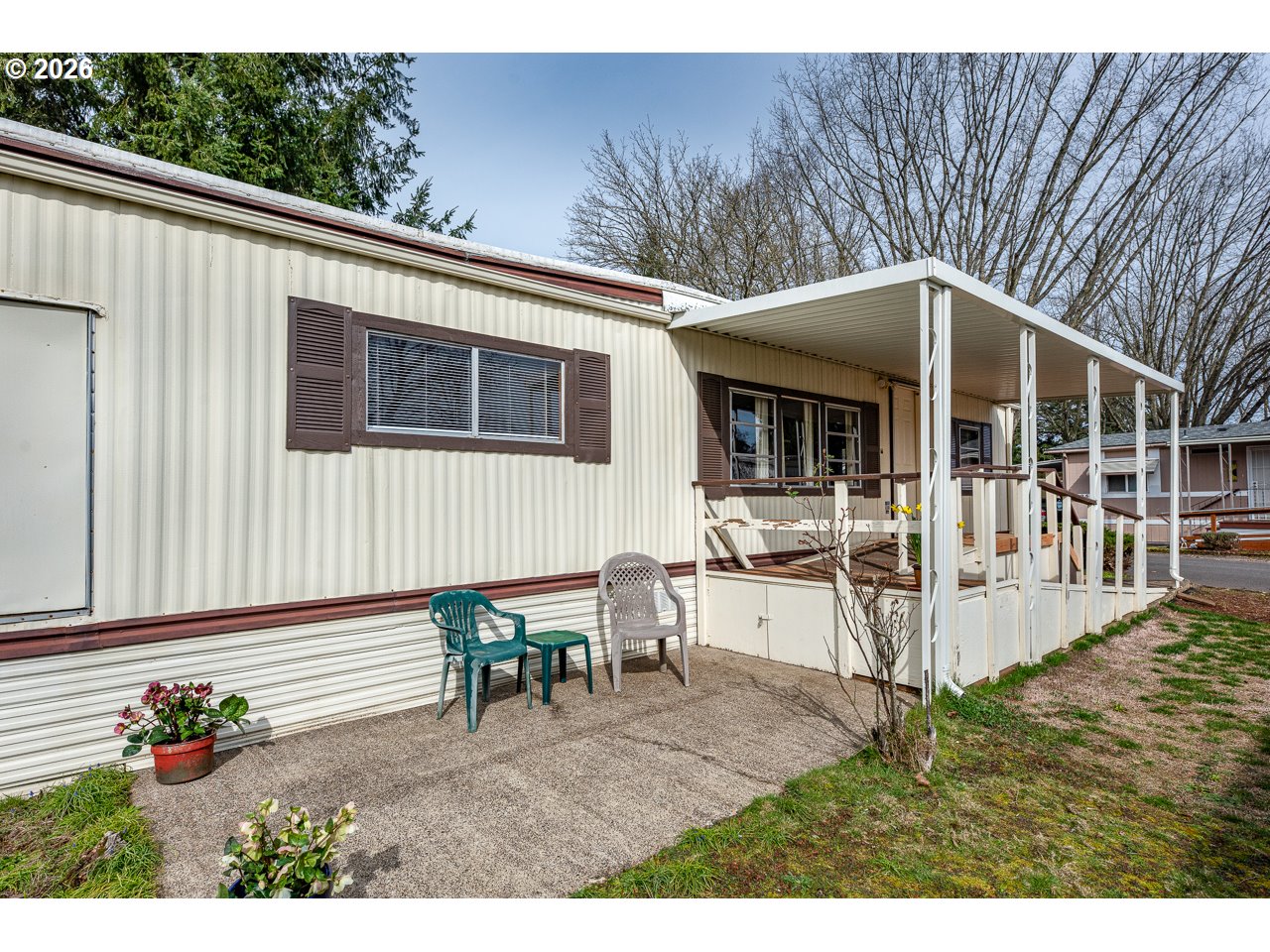 1475 Green Acres Road, Unit 172 Eugene, OR 97408 - Photo 2 of 20 a view of a house with patio