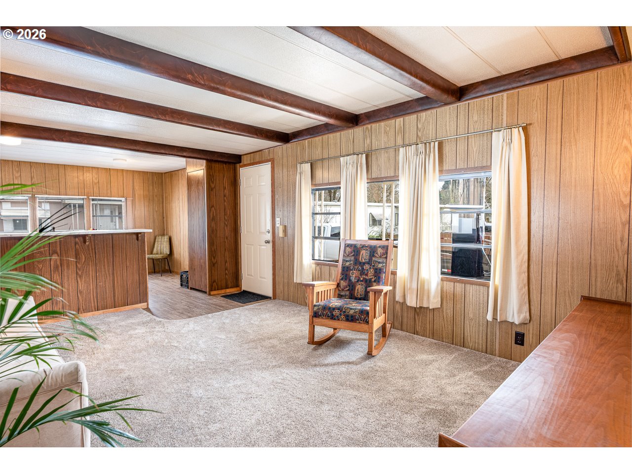 1475 Green Acres Road, Unit 172 Eugene, OR 97408 - Photo 7 of 20 a living room filled with furniture