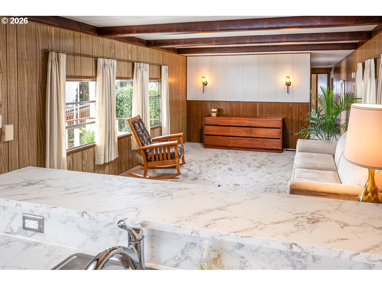 1475 Green Acres Road, Unit 172 Eugene, OR 97408 - Photo 10 of 20 a living room with furniture and a large window