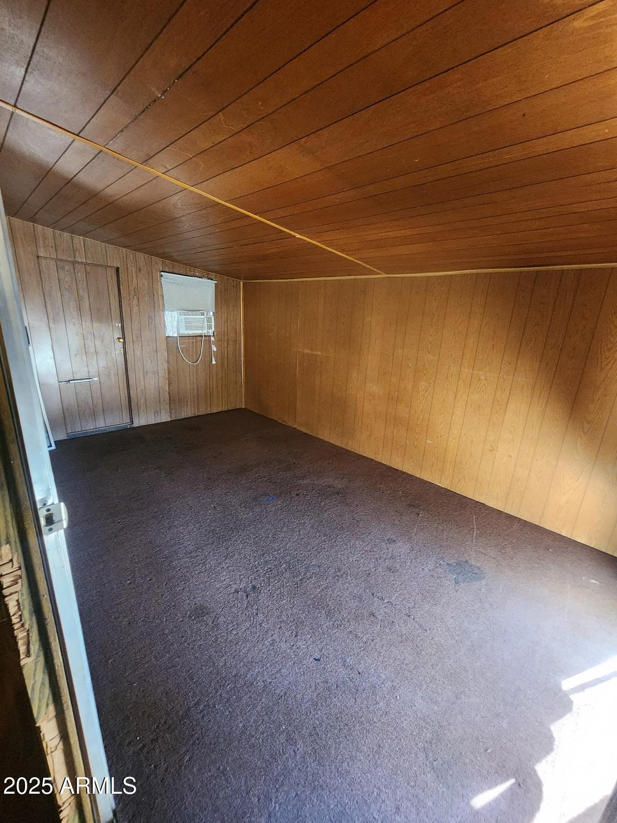 671 South Ellsworth Road, Unit A Mesa, AZ 85208 - Photo 8 of 8 a view of a room with wooden floor and staircase