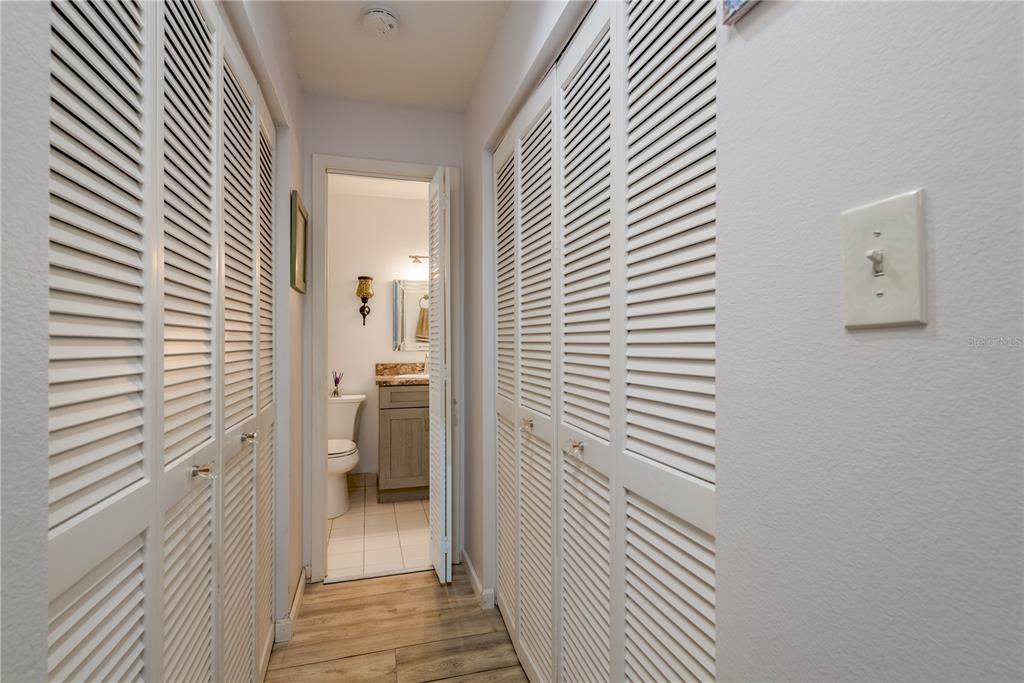 1901 Lennox Road East, Unit 1901 Palm Harbor, FL 34683 - Photo 13 of 25 a view of a bathroom from a hallway