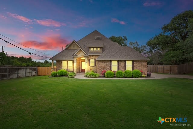 3306 Spring Canyon Road Belton, TX 76513 - Photo 1 of 40 a front view of a house with a yard