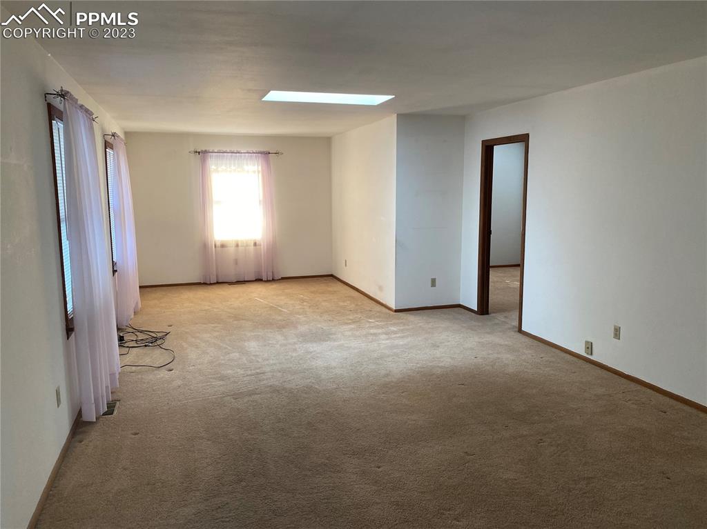 2150 Glenn Street Colorado Springs, CO 80904 - Photo 18 of 30 a view of an empty room with a window