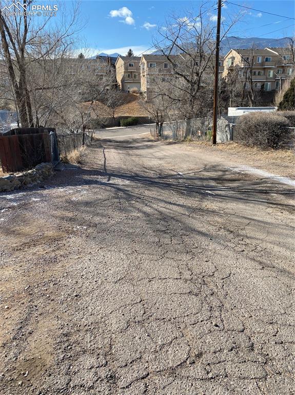 2150 Glenn Street Colorado Springs, CO 80904 - Photo 29 of 30 a view of a parking space with wooden fence
